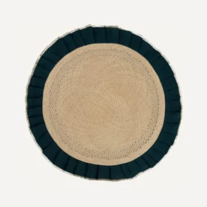 Arandela placemat in teal, handwoven iraca palm and linen, styled on a table